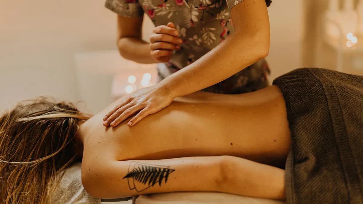 Licensed stock massage therapy room visual; not a photo of this business